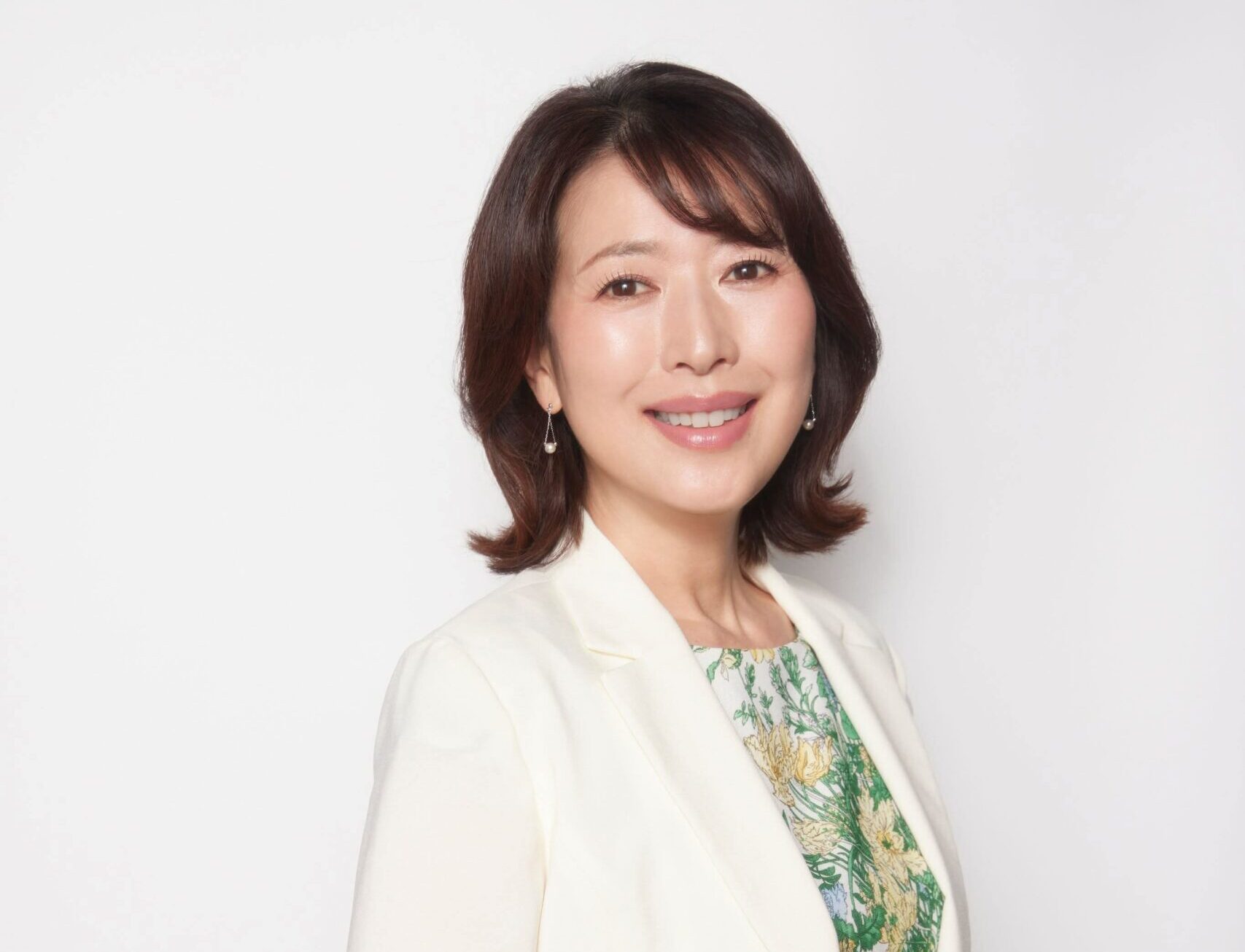 川﨑 まゆみさんの左写真